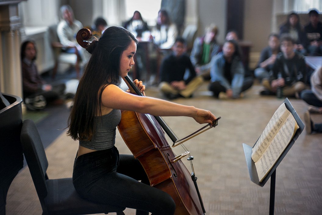Student plays cello in Parrish Parlors