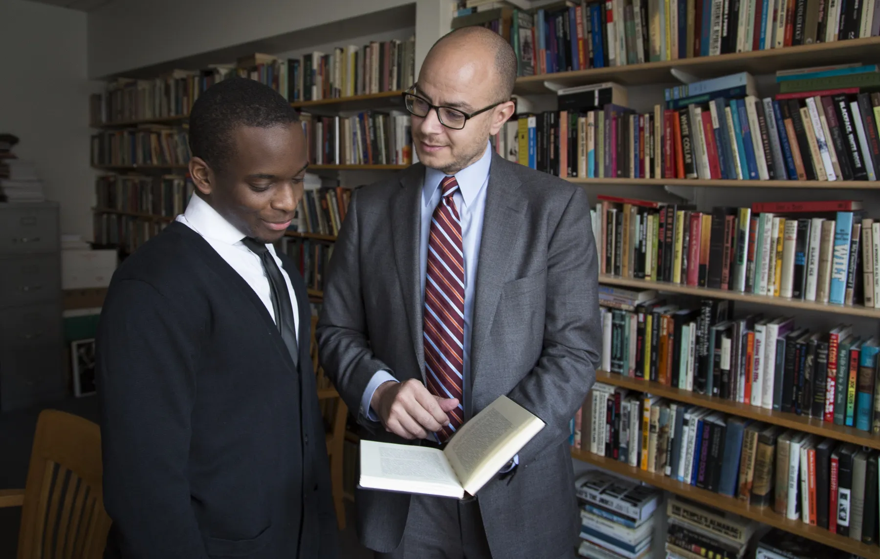 Professor Foy speaking to fellow