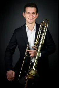 photo of Justin Moore and trombone