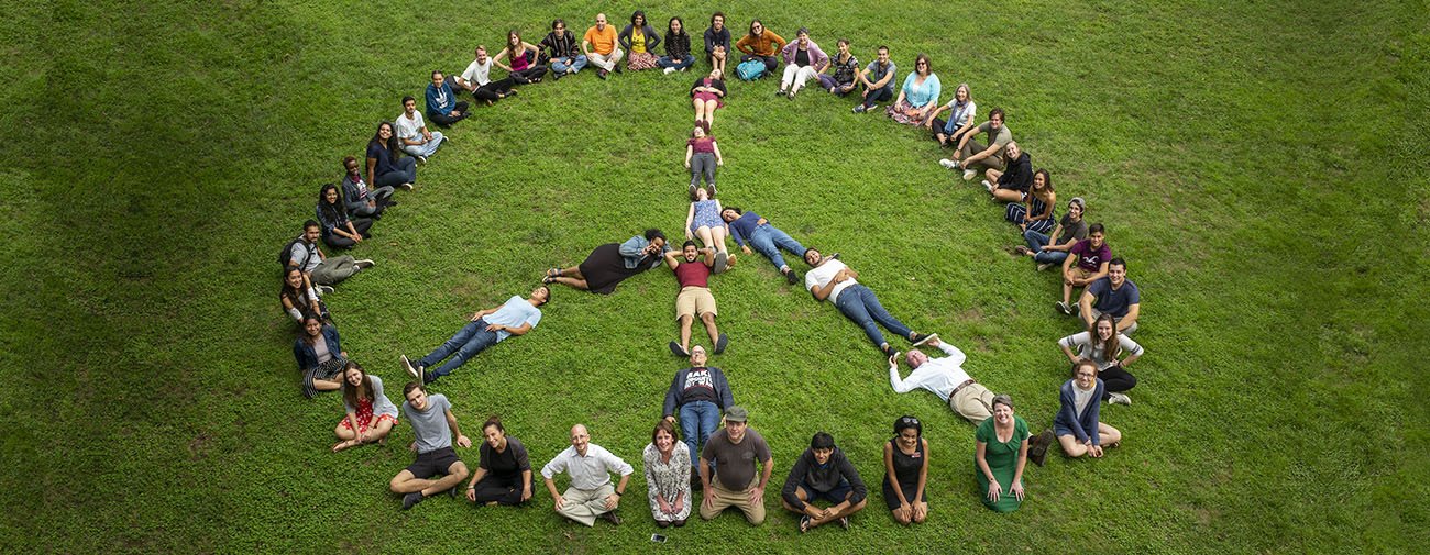 students making a peace sign
