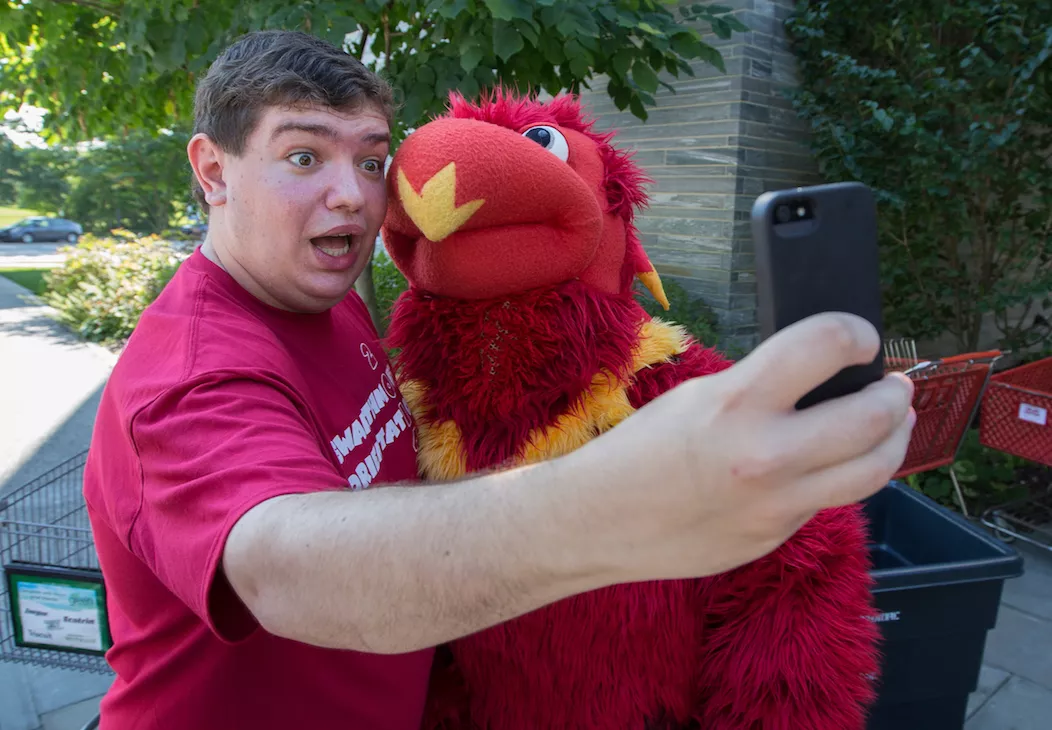 student posing with Phineas Phoenix