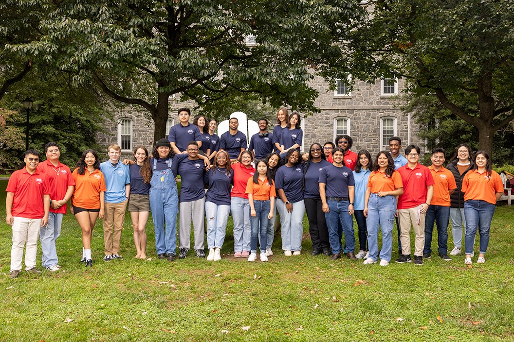 Group of Swarthmore Summer Scholars posing in front of Big Chair near Parrish Hall