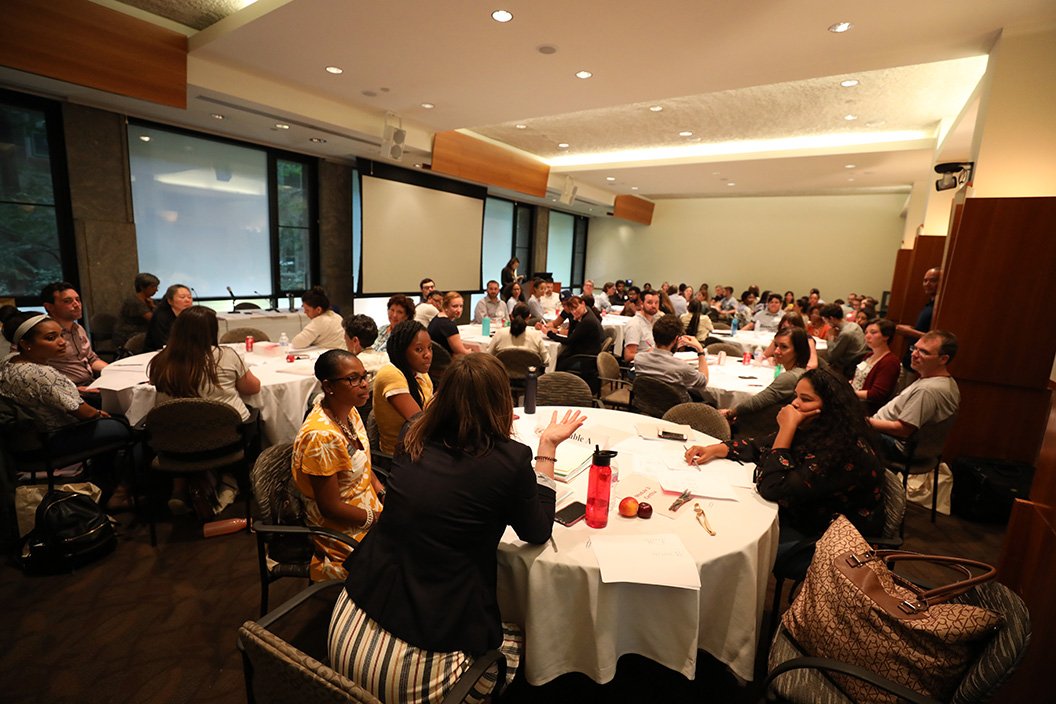 Room filled with access summit participants