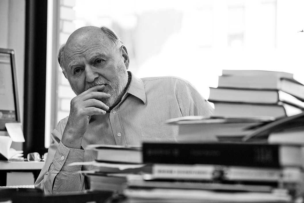 Black and white photo of Victor Navasky in his office