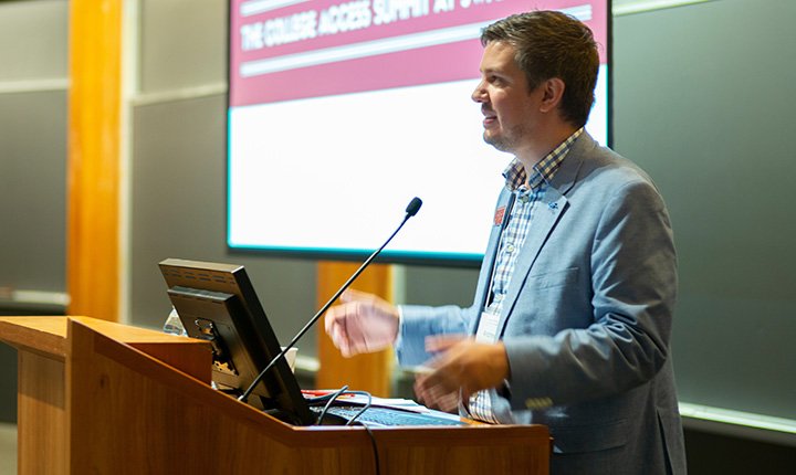 Andrew Moe speaks at college access summit