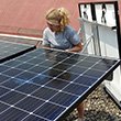 Izzy Branco-Lo '18 installing solar panels