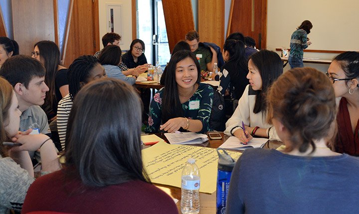 Students discussing leadership in a group