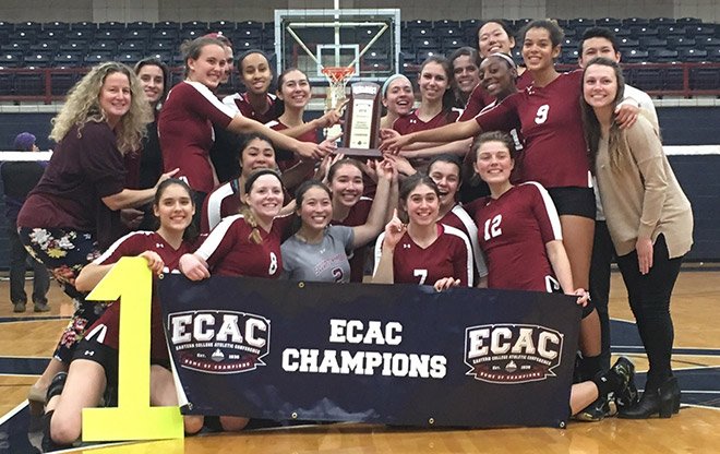 Garnet Volleyball post with their championship trophy