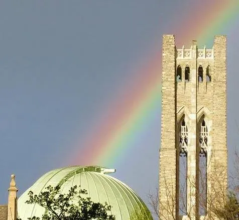 Rainbow stretching between the Sproul dome and Clothier Bell Tower.