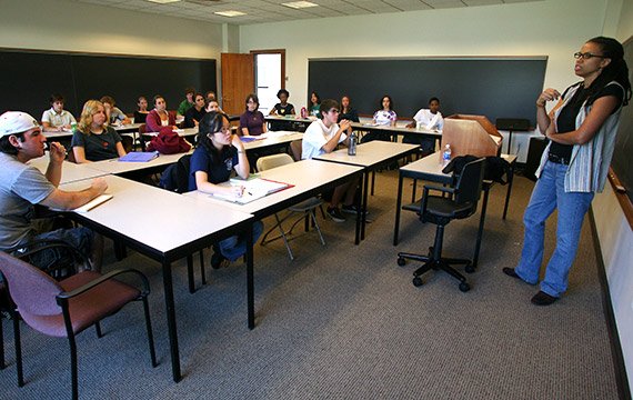 Students in a discussion with a professor