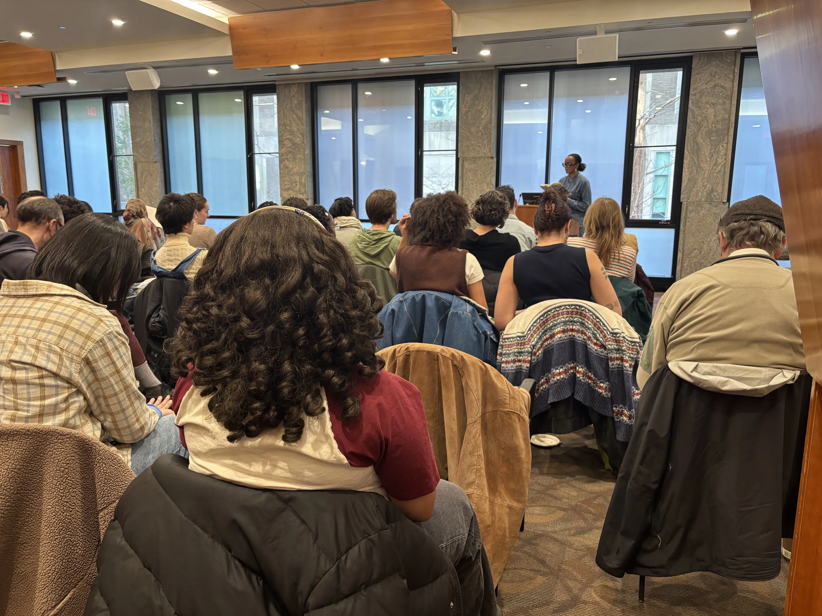 Angela Flournoy reading to the audience