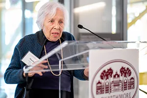 Maxine Frank Singer speaks at podium