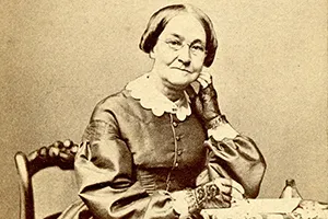 Mira Sharpless Townsend sitting in a chair