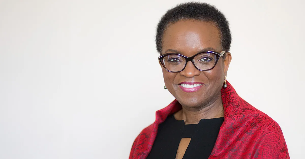 Image of Val Smith wearing red jacket 