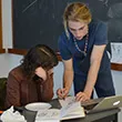 David Holmgren '18 instructs Sarah Parks '19