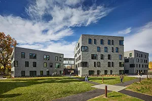 PPR Apartments underneath a blue sky in the fall