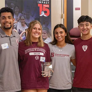Group of Swarthmore College student-athletes accept award from Team IMPACT